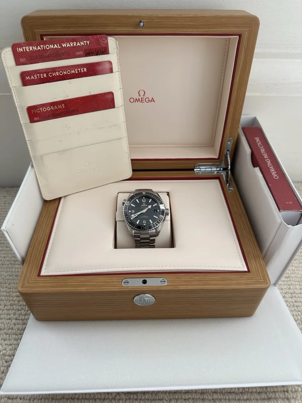 Omega Planet Ocean 215.30.44.21.01.001 - 2024 - Papiers de la boîte – Image 2